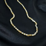 Patterned stone design on gold tone chain necklace