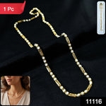 Close-up of gold chain necklace highlighting stone detailing