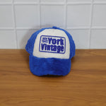 Live modeling shot of vintage plush winter cap
