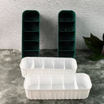 Close-up of a 5-compartment drawer organizer filled with neatly folded socks.