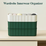 Angled view of four stackable 5-compartment drawer organizers, ideal for closets.