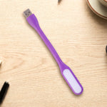 Flexible USB LED Light positioned precisely over a laptop keyboard.