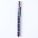 The magnetic pen creatively arranged into various abstract shapes on a desk.