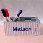 Plastic container box-style desk organizer resembling shipping container