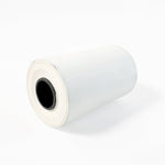Close-up view of thermal label roll showing label texture
