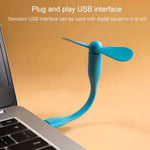 Compact portable USB fan in use for personal cooling