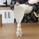 Side view of rice spoon with cute bunny handle design