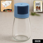 Glass salt shaker showing precise 0.5g salt dispensing
