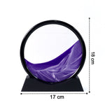 Relaxing liquid motion desk art with a round glass frame, perfect for home or office decor.