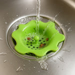 Flexible silicone drain hair catcher designed for bathroom wash basin drains.