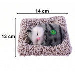 Side perspective of plush open-eye cat figurine