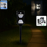 Solar motion sensor LED wall lamp mounted outdoors providing bright light