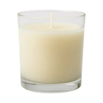 Scented votive candle adding a festive touch to Diwali decorations.