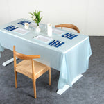 Folded plastic table cover compact for storage and transport