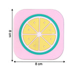 Bright yellow lemon silicone drink coaster displayed on coffee table