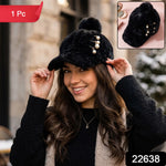 Side view of cozy winter fur cap with pom pom accessory