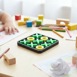 Close-up of sturdy Tic Tac Toe game pieces with interlocking design
