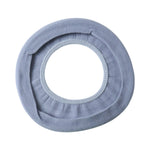 Toilet seat with soft fabric cover installed for hygiene