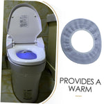 Hygienic toilet seat protector cover in bathroom setting