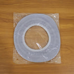 Bathroom setting with soft fabric toilet seat cover