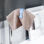 Set of 6 colorful towel clips arranged for display