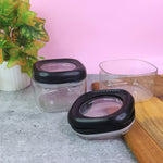 Two transparent plastic storage containers with twist and lock lids by Supermom