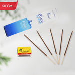 Burning Agarbatti incense sticks creating a serene ambiance during a pooja ceremony.