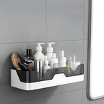 Overview of mounted plastic adhesive storage shelf on wall