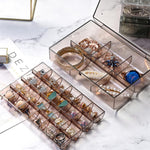 Close-up of the dustproof lid on the 2-layer acrylic jewelry organizer.