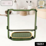 Green and gold 2-in-1 soap holder and towel rack in bathroom