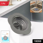 Single piece plastic sink strainer fitting standard kitchen and bathroom drains