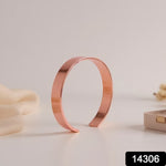 Rose gold kada bracelet displayed on a stand