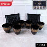 Side view of the Indo Glow ceramic cups and bowls, showcasing their glossy finish.