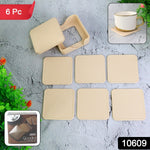 Square coasters placed on a table safeguarding it from moisture and heat