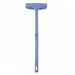 Side view highlighting the versatile brush, scraper, and cleaning pad features of the tool.