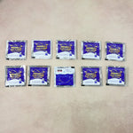 Display of effervescent car windshield cleaner tablets for vehicle maintenance