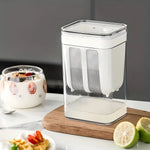 Close-up of fine mesh strainer basket inside yogurt maker for whey separation.