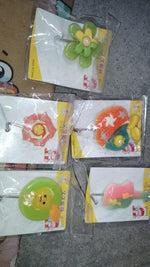 Multipurpose frog-shaped self-adhesive wall hook enhancing bathroom organization.