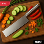 Vegetable cleaver knife chopping fresh vegetables in kitchen