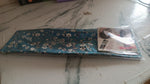 Detailed close-up of the Knotted Wire Headband's fabric texture and knot design.