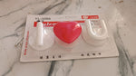 Multi-purpose adhesive hooks mounted on tile and glass surfaces