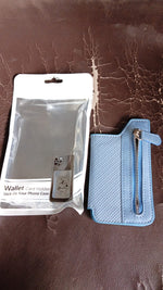Slim profile of the adhesive phone wallet holder attached to a phone.
