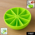 Bright green lemon wedge silicone ice cube tray filled with water ready to freeze