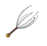 Relaxing with the handheld scalp massager, promoting blood circulation on the scalp.