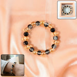 Front view of Dual-Tone Crystal Beaded Stretch Bracelet with translucent pink and gold beads