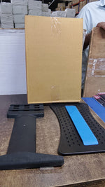 Multi-level back stretcher posture corrector device neatly packaged, ready for secure shipping.