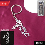 Close-up of spiritual Krishna flute shaped metal keyring