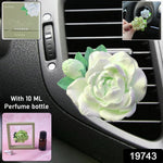 Close-up of elegant rose flower air freshener clip for car AC vent