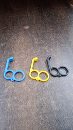 Close-up of hook-style plastic mobile holder stand with universal fit