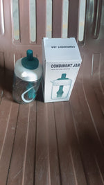 Secure lid and silicone brush mechanism of the glass oil dispenser.